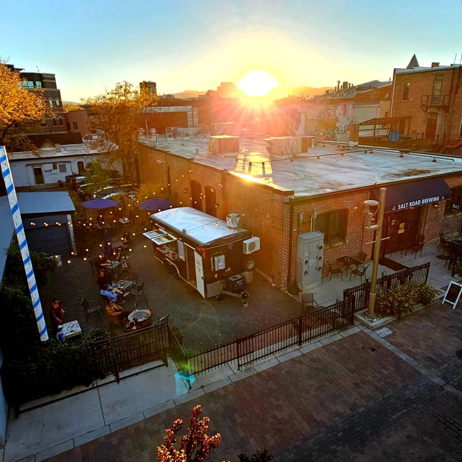 Sunset over Salt Road Brewing's outdoor patio and food truck in Old Town Fort Collins